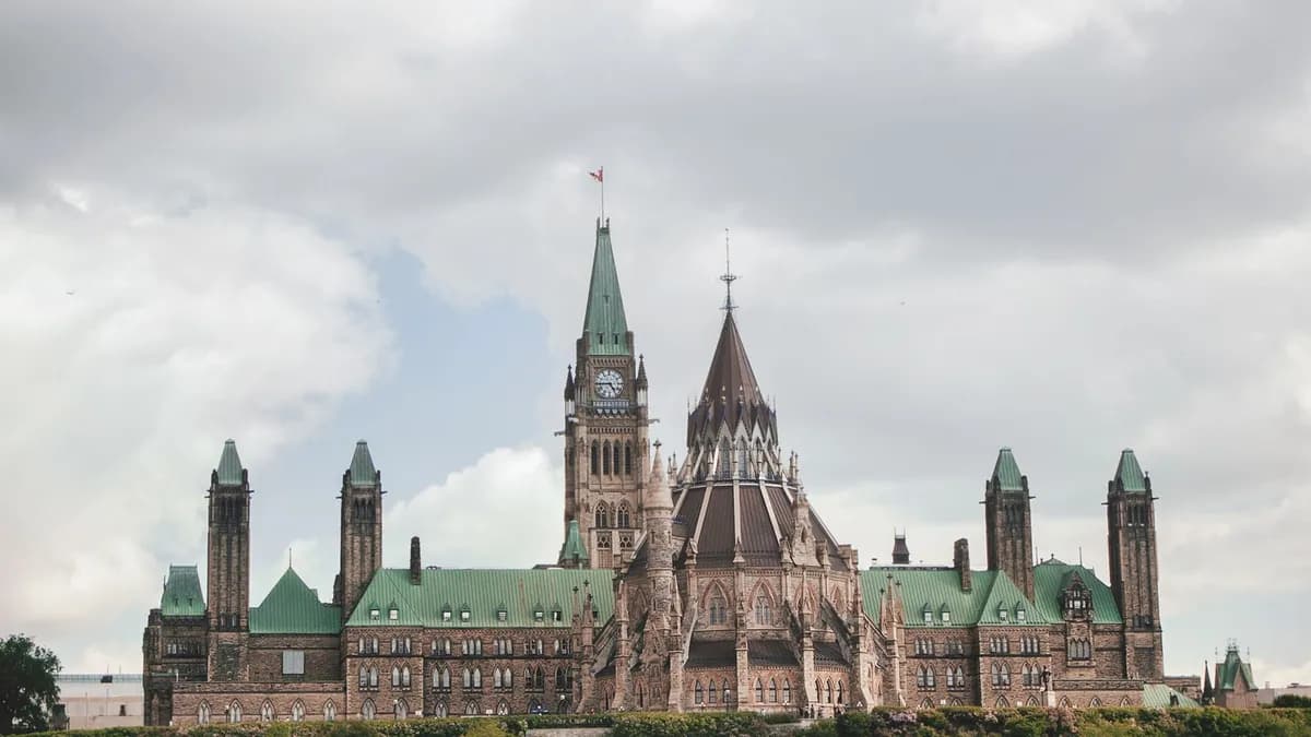 Canada's Parliament buildings on Parliament Hill in Ottawa, the Canadian flag on top of the Peace Tower