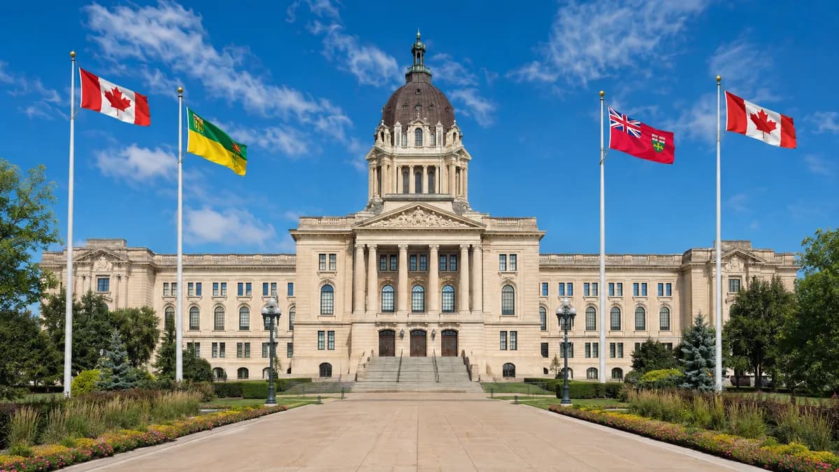 A Canadian provincial legislature building with flags